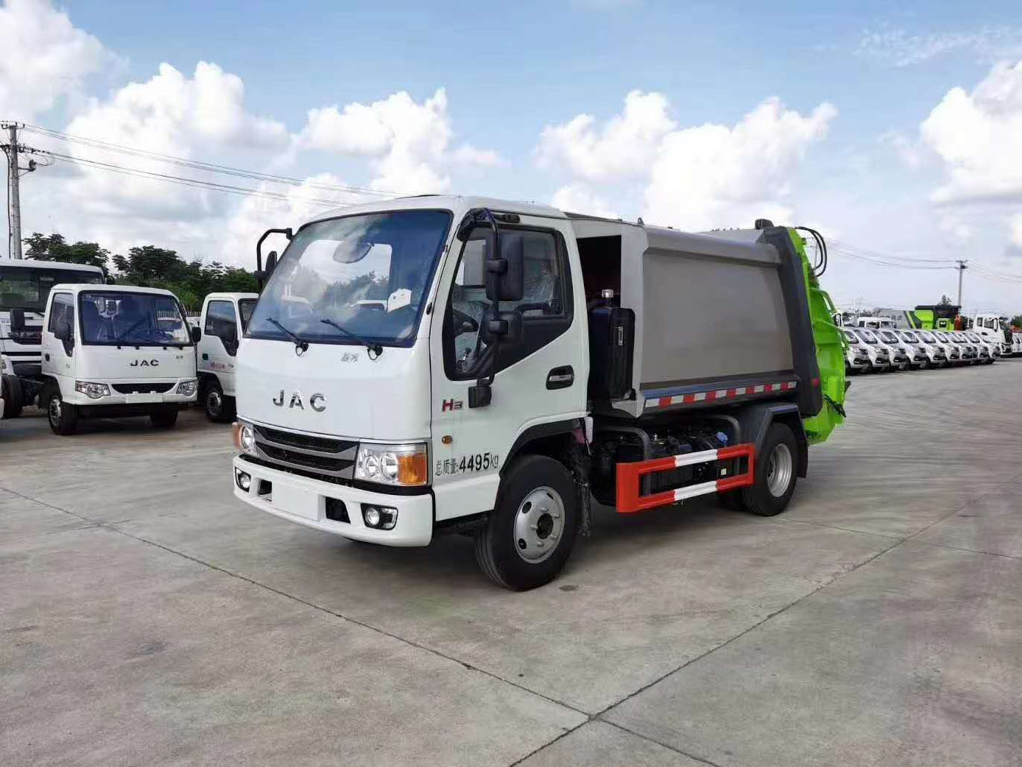 Front view of JAC 3-ton compactor garbage truck